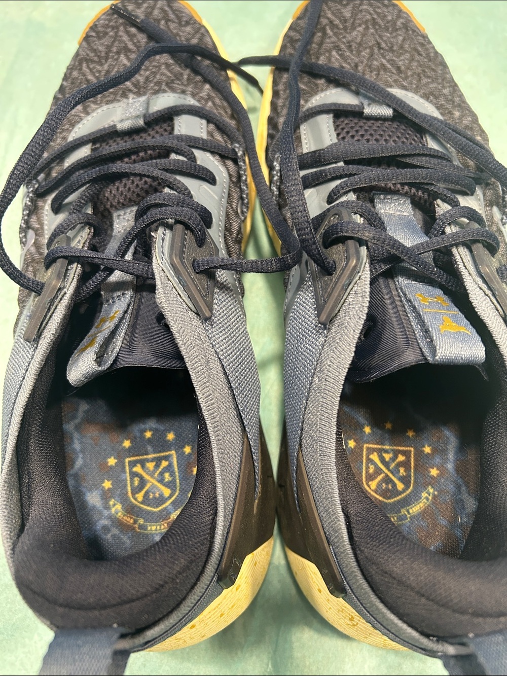 Men's Black and Gray Sneakers with Gold Accents - Brand Unspecified